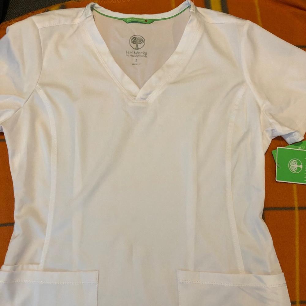 White scrub top- NEW w/ TAGS. Size Small